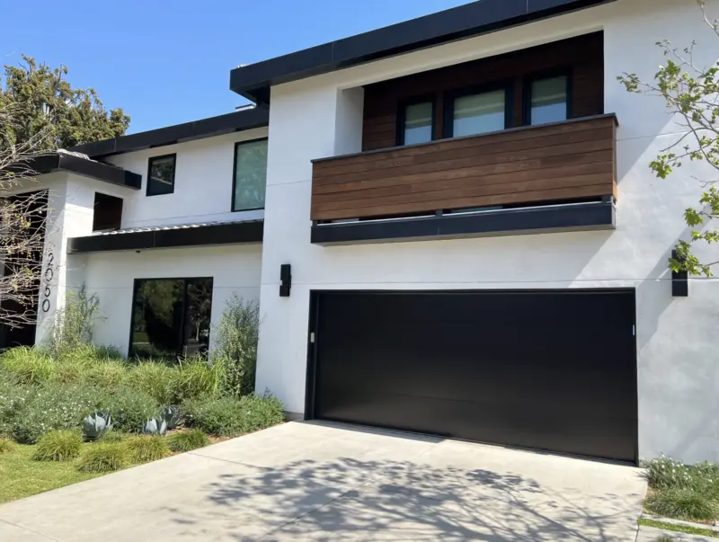 #15 C.H.I. 2717 Sterling in Black garage featuring two large doors