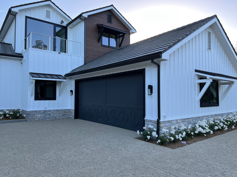 #3 Carriage House Door Custom Wood Door - Customer Painted. garage featuring two large doors